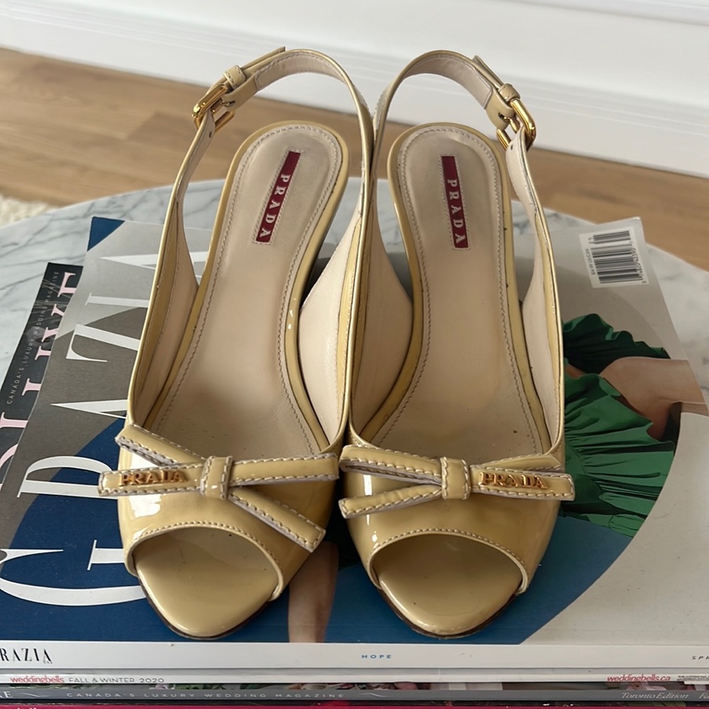 Cream patent leather Prada sling back